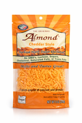 Package of Almond Cheddar Style cheese alternative on a white background